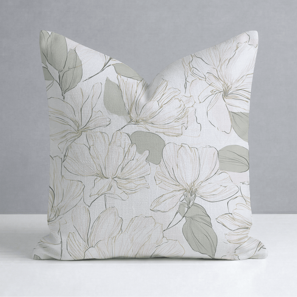 The Hillcroft x Lemon Park - Tangled Throw Pillow by Hillcroft Home is a square pillow with a white background, adorned with a delicate floral pattern in soft gray and green tones. Expertly crafted in the USA from a linen blend, this throw pillow features elegantly outlined flowers and leaves in light colors for a minimalist and refined design.